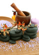Foto: spa composition of bath salt, stones and bottle on white spa composition of bath salt, stones and bottle on white