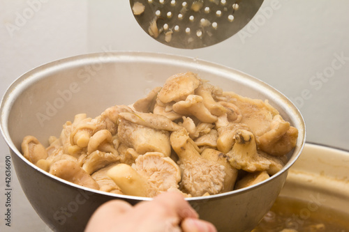 Photo: Mushrooms cook in a pan Mushrooms cook in a pan