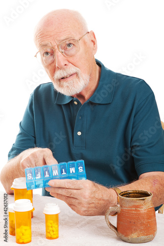 Photo: Senior Man Forgot to Take Medicine Senior Man Forgot to Take Medicine