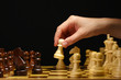 Chess board with chess pieces isolated on black