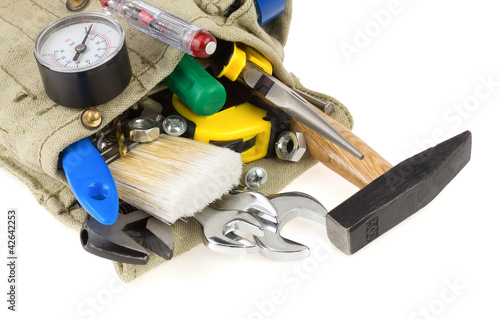 Photo: tools in belt bag isolated on white tools in belt bag isolated on white