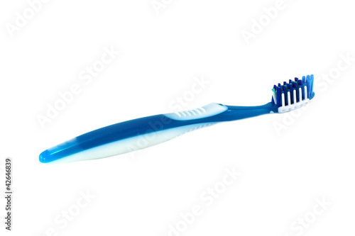 Photo: tooth brush isolated on a white background tooth brush isolated on a white background