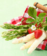 Serving of fresh green and white asparagus