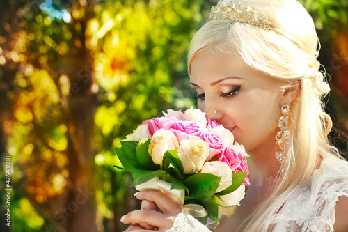 Photo: Bride with bouquet in the hands Bride with bouquet in the hands