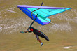 Hang glider pilot in Italian mountains