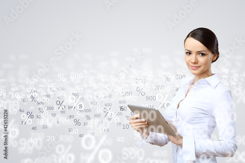 Photo: Business person and finance related background Business person and finance related background