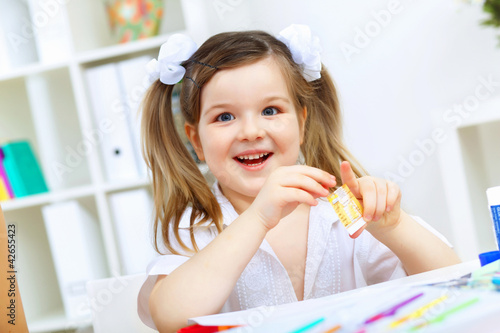 Photo: Little girl studying Little girl studying