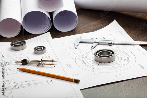 Photo: Tools and papers with sketches Tools and papers with sketches