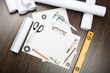 Photo: Tools and papers with sketches Tools and papers with sketches