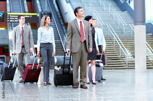 Photo: Group of business people at the airport. Group of business people at the airport.