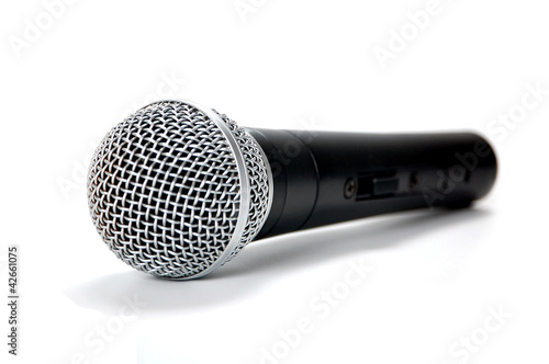 Photo: Black Microphone on White Background Black Microphone on White Background