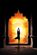 Yoga silhouette in temple