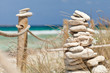 Photo: Balanced stones near the beach. Formentera island. Spain. Balanced stones near the beach. Formentera island. Spain.