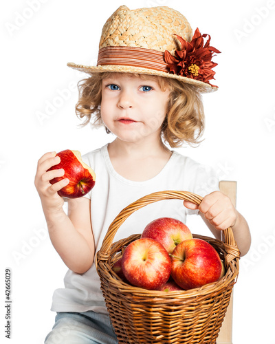 Photo: Child with basket of apples Child with basket of apples