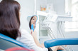 Photo: woman checkin her teeth woman checkin her teeth