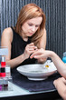 Attractive woman having a manicure at the salon