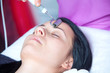 young woman in cosmetic cabinet