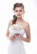 Happy beautiful bride with bouquet of wedding flowers