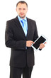 Portrait of a businessman with a tablet computer
