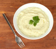 Mashed potato with parsley in the bowl