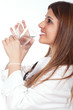 female doctor holding and drinking water