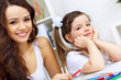 Foto: Mother and daughter studying Mother and daughter studying