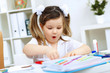 Foto: Little girl studying Little girl studying