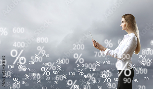 Photo: Business person and finance related background Business person and finance related background