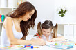 Foto: Mother and daughter studying Mother and daughter studying