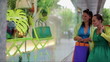 Video: Woman looking at shop exhibition with sales promotion Woman looking at shop exhibition with sales promotion