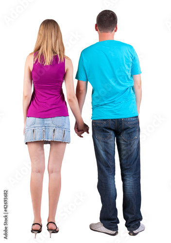 Photo: Back view of young embracing couple Back view of young embracing couple