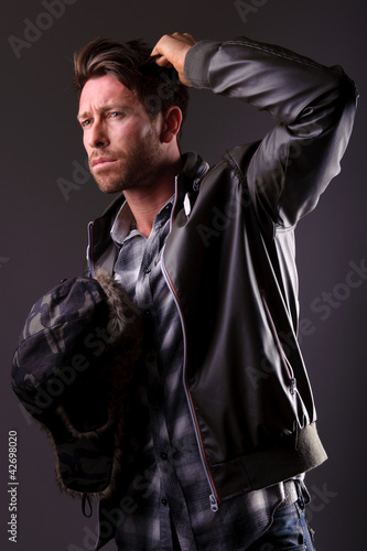 Photo: Handsome man in leather jacket Handsome man in leather jacket