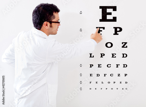 Photo: Optemetrist making a vision test Optemetrist making a vision test