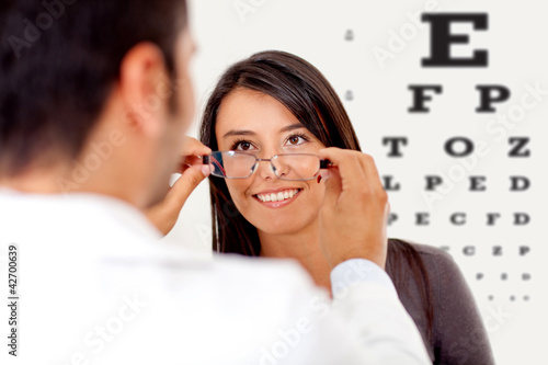 Photo: Woman wearing glasses Woman wearing glasses