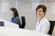 Portrait of smiling woman wearing headset