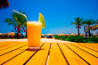 Tasty juice with melon opposite the beach