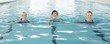 Portrait of smiling women swimming in swimming pool