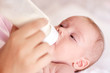Drinking milk to help his growth