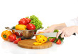 woman hands cutting vegetables on kitchen blackboard