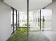 View of courtyard from windows of modern house