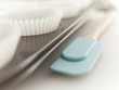 Close up of spatula and cupcake wrappers