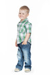 Photo: Adorable smiling little boy looks at the viewer Adorable smiling little boy looks at the viewer