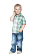 Photo: a little boy talking on the phone. isolated on white a little boy talking on the phone. isolated on white