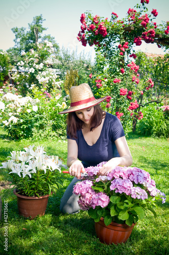 Photo: Young woman gardening Young woman gardening
