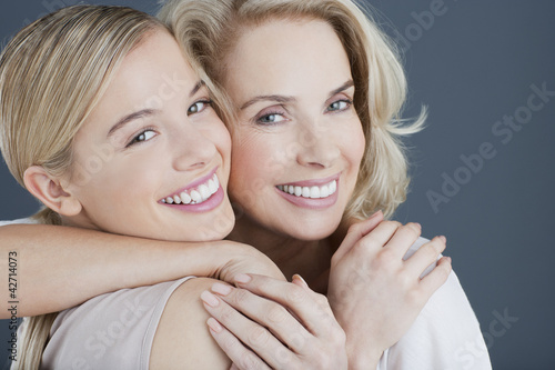 Photo: Portrait of smiling mother and daughter Portrait of smiling mother and daughter