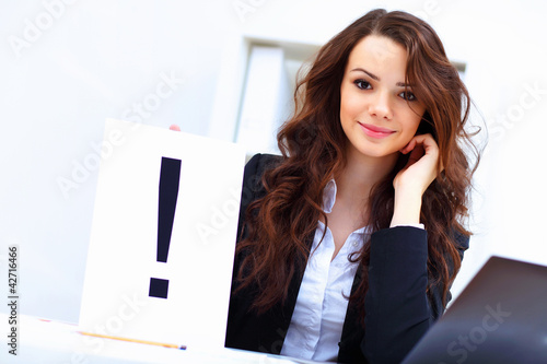 Photo: Young busines woman with notebook Young busines woman with notebook