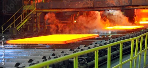Photo: hot steel on conveyor hot steel on conveyor