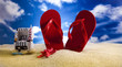 Foto: Flip-flops on a sandy beach Flip-flops on a sandy beach