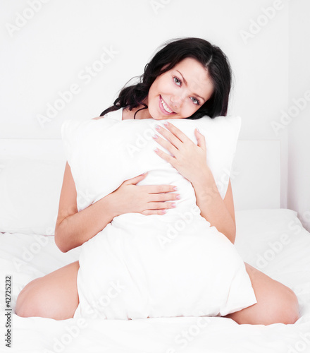 Foto: woman with a pillow woman with a pillow