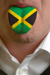 man tongue painted in jamaica flag symbolizing to knowledge to s